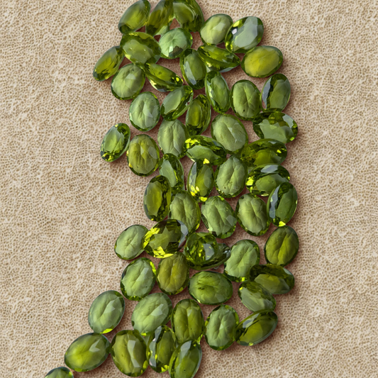 Natural Peridot Parcel – 60 Carats | 56 Oval Cut Gemstones | VVS–VS Clarity