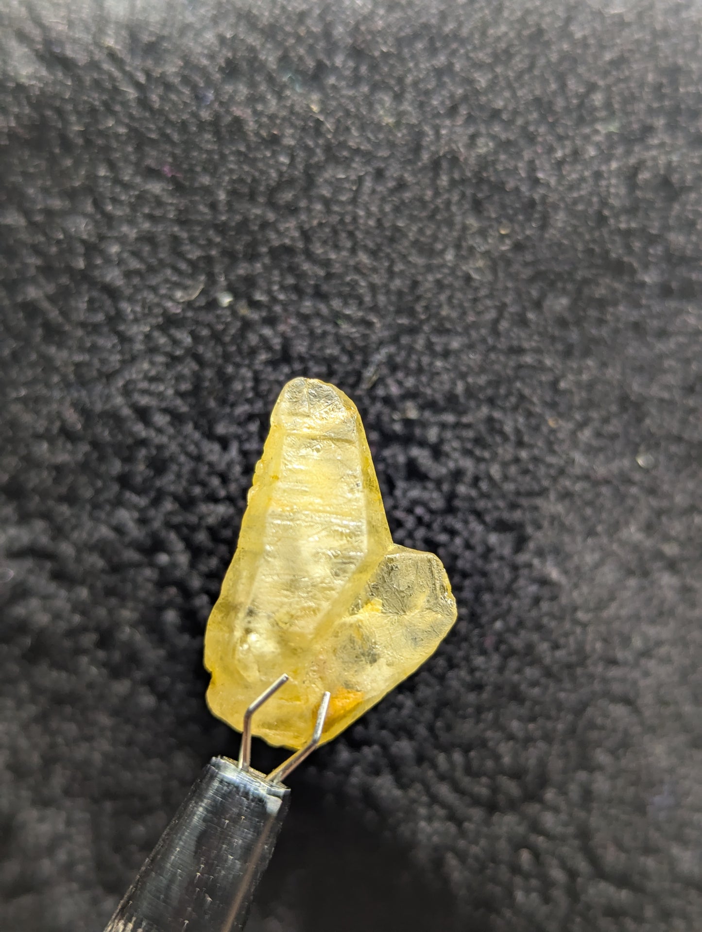 Natural twinned yellow sapphire crystal, 19.4ct with a unique raw structure and warm golden color. A perfect collectible or centerpiece for custom jewelry.