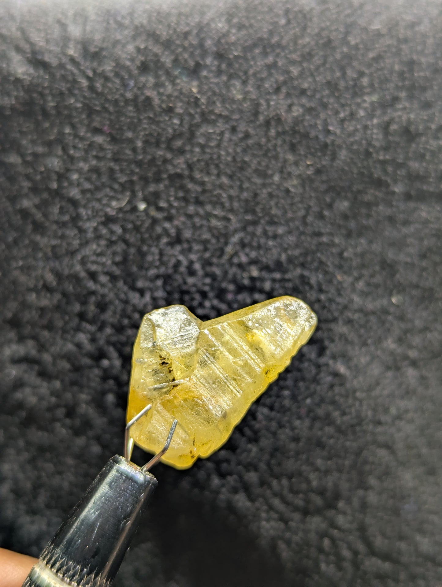 Natural twinned yellow sapphire crystal, 19.4ct with a unique raw structure and warm golden color. A perfect collectible or centerpiece for custom jewelry.
