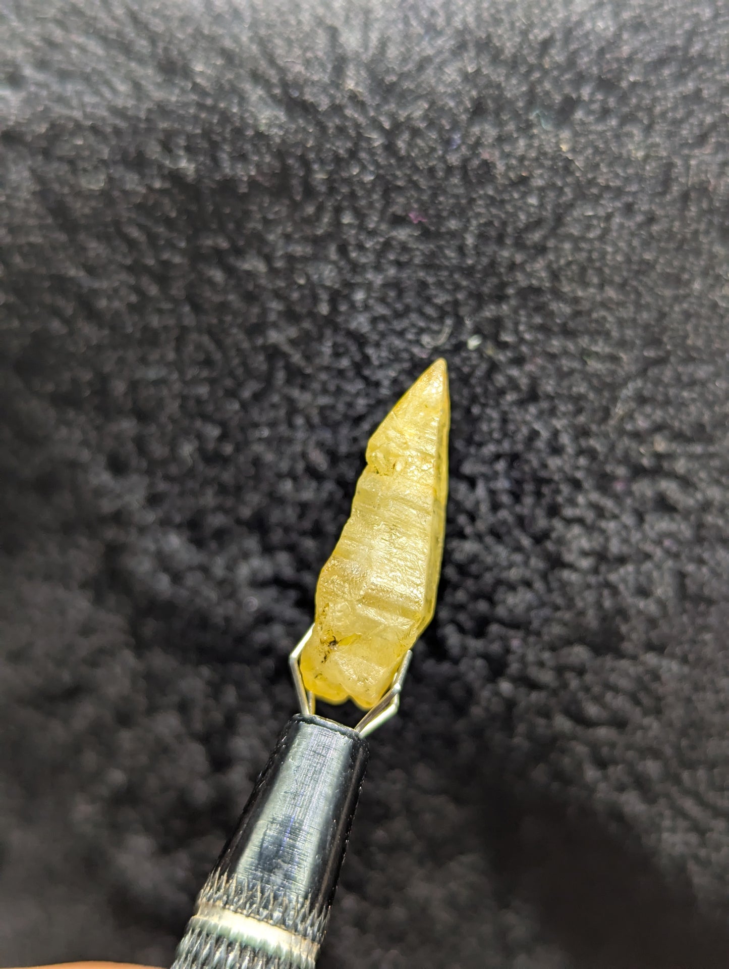 Natural twinned yellow sapphire crystal, 19.4ct with a unique raw structure and warm golden color. A perfect collectible or centerpiece for custom jewelry.