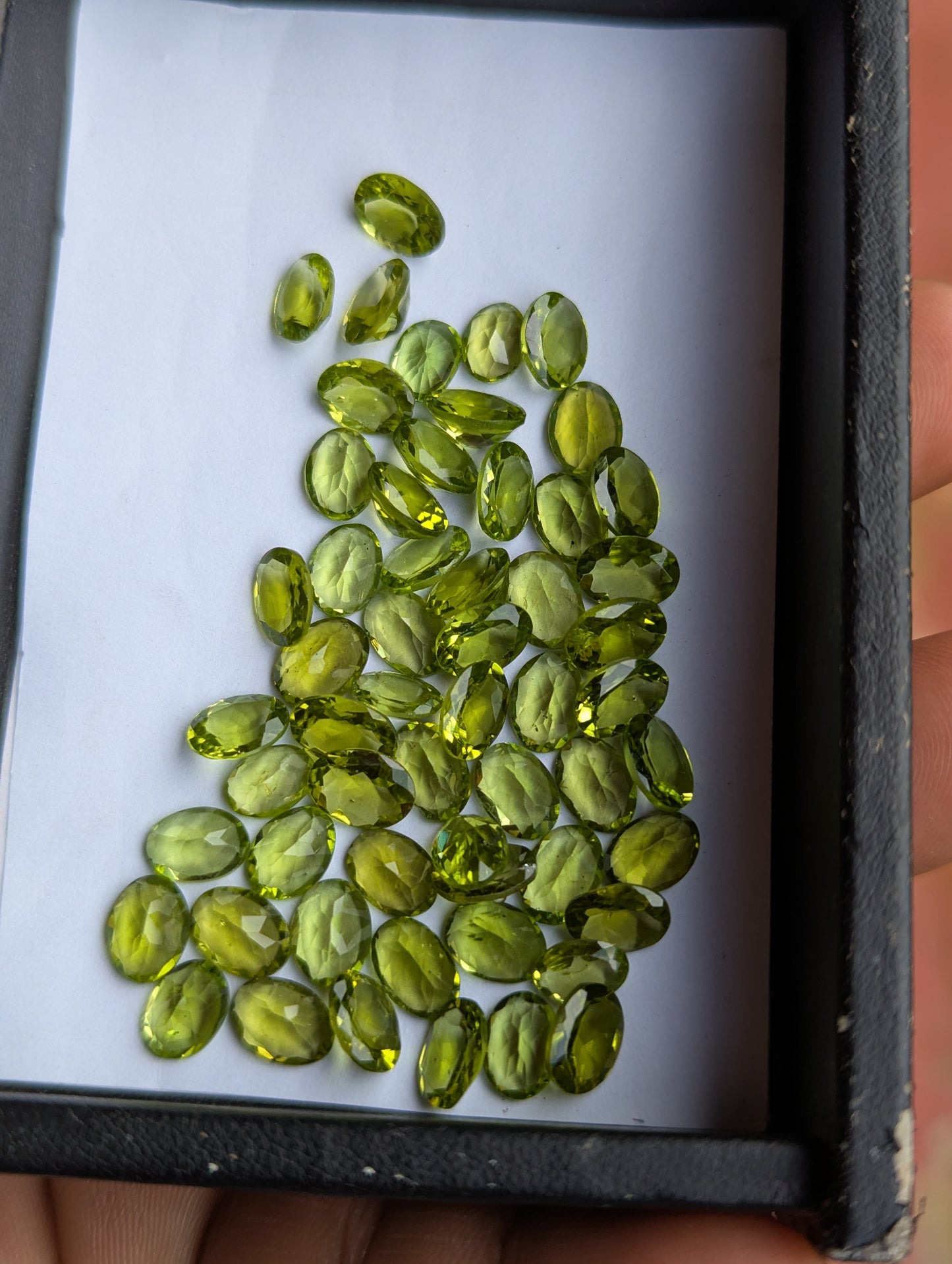 Natural Peridot Parcel – 60 Carats | 56 Oval Cut Gemstones | VVS–VS Clarity